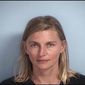 This photo provided by Walton County Sheriff&#39;s Office shows Terri White, the commissioner for the Oklahoma Department of Mental Health and Substance Abuse Services, who was jailed July 21, 2017, on a misdemeanor battery complaint after calling police in attempts to deescalate a family dispute. White was arrested in Florida after throwing a cup of water on a family member during a confrontation, but her case was dismissed because prosecutors said the family member decided not to pursue charges, the official said Saturday, July 29, 2017. (Walton County Sheriff&#39;s Office via AP)