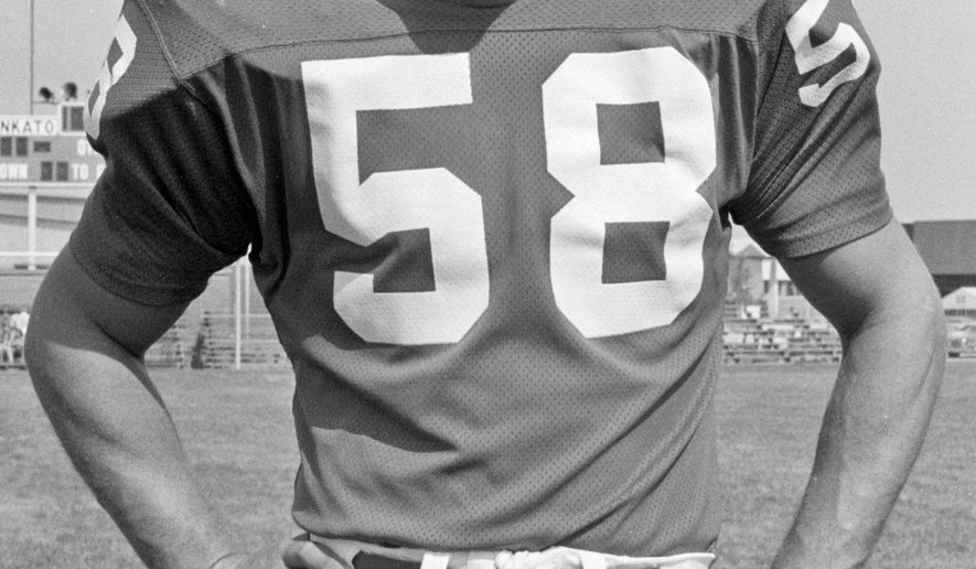 FILE - In this Aug. 6, 1973 file photo, Minnesota Vikings linebacker Wally Hilgenberg is shown. Mary Hilgenberg has been a widow for nine years, having lost her husband Wally to a debilitating disease brought on by his hard-hitting career in the NFL with the Vikings. Now her role is to support other wives of ailing former players, with a mission to keep as many kids away from the sport as she can. (AP Photo/File)