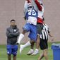 New York Giants cornerback Janoris Jenkins (20) intercepts a pass intended for wide receiver Sterling Shepard (87) during NFL football training camp, Saturday, July 29, 2017, in East Rutherford, N.J. (AP Photo/Julio Cortez)