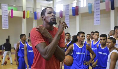 2017 NBA Most Valuable Player, Kevin Durant of the Golden State Warriors gestures during his tour of NBA Academy in Greater Noida near New Delhi, India, Friday, July 28, 2017. Durant is in India to support the continued growth of basketball in the country and meet the elite prospects of NBA Academy India. (AP Photo/Altaf Qadri)