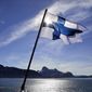 The flag of Finland flies aboard the Finnish icebreaker MSV Nordica as it arrives into Nuuk, Greenland, after traversing the Northwest Passage through the Canadian Arctic Archipelago, Saturday, July 29, 2017. After 24 days at sea and a journey spanning more than 10,000 kilometers (6,214 miles), the MSV Nordica has set a new record for the earliest transit of the fabled Northwest Passage. The once-forbidding route through the Arctic, linking the Pacific and the Atlantic oceans, has been opening up sooner and for a longer period each summer due to climate change. (AP Photo/David Goldman) **FILE**