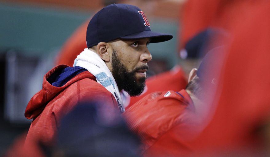 Boston Red Sox starting pitcher David Price sits in the dugout in the seventh inning during a baseball game against the Kansas City Royals at Fenway Park, Friday, July 28, 2017, in Boston. The Red Sox announced that Price was added to the 10-day disabled list prior to the game. (AP Photo/Charles Krupa)