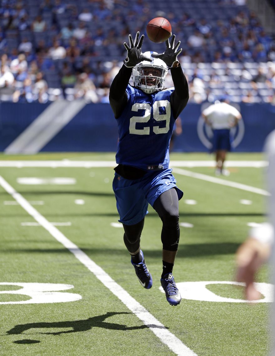 Indianapolis Colts safety Malik Hooker (29) makes a catch during a drill at the NFL team's football training camp in Indianapolis, Sunday, July 30, 2017. (AP Photo/Michael Conroy)