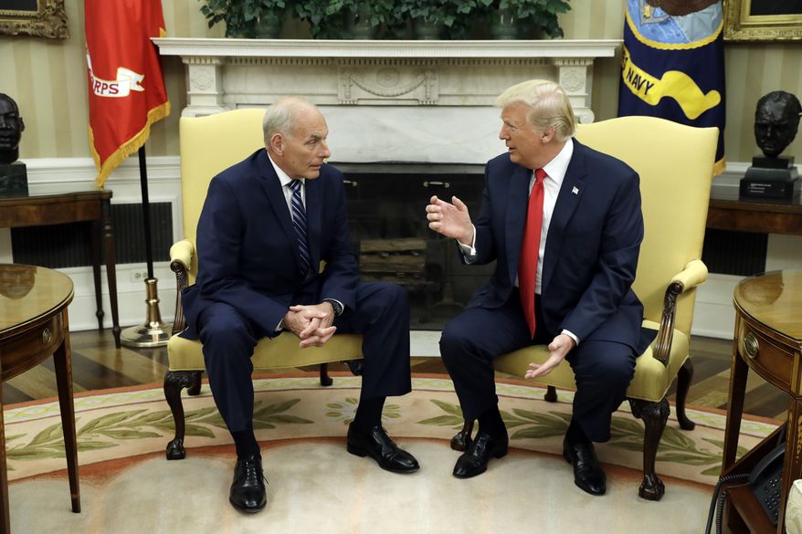New White House Chief of Staff John Kelly talks with President Donald Trump after being privately sworn in during a ceremony in the Oval Office, Monday, July 31, 2017, in Washington. (AP Photo/Evan Vucci)