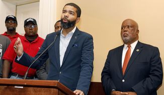 Jackson, Miss., Mayor Chokwe Antar Lumumba, center, expresses his support for a intimidation free union election during a Jackson, Miss., news conference, Monday, July 31, 2017. Lumumba joined Canton, Miss., mayor and U.S. Rep. Bennie Thompson, D-Miss., right, in expressing their support for an intimidation free union vote at the Nissan vehicle assembly plant in Canton, Miss. (AP Photo/Rogelio V. Solis) ** FILE **