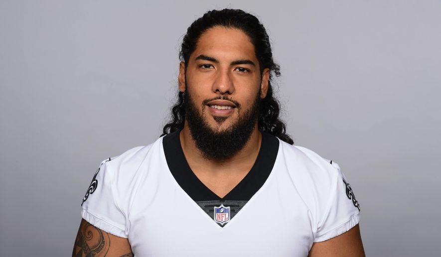 This is a 2017 file photo showing Kikaha Hau'oli of the New Orleans Saints NFL football team. Saints defensive end Hau'oli Kikaha appreciates the skepticism surrounding his ability to come back from a third left anterior cruciate ligament tear. The 2015 second-round draft pick, who set sack records at Washington, is nonetheless determined to reward the faith New Orleans has shown in him by keeping him around. (AP Photo/File)
