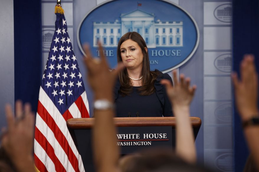 White House press secretary Sarah Huckabee Sanders listens to a question during the daily press briefing, Tuesday, Aug. 1, 2017, at the White House in Washington. (AP Photo/Evan Vucci)
