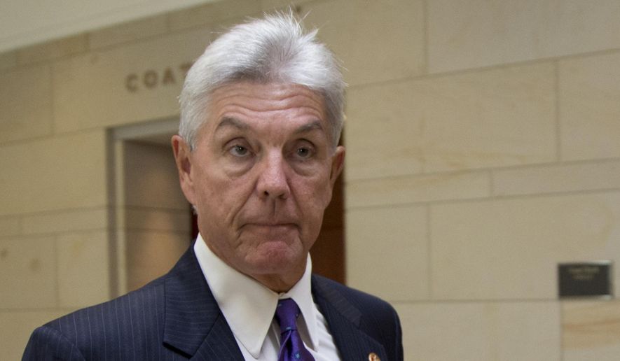 In this Sept. 1, 2013, file photo, Rep. Roger Williams, R-Texas, walks through the U.S. Capitol in Washington. (AP Photo/Carolyn Kaster, File)
