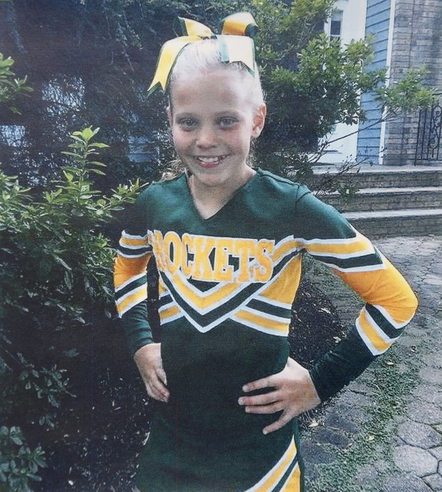 In this undated photo provided by Dianne Grossman, her daughter Mallory Grossman poses for a picture. The New Jersey mother is suing her late daughter's school district because she said they didn't do enough to stop cyber bullying against her daughter that led the 12-year-old to kill herself. (Courtesy of Dianne Grossman via AP)