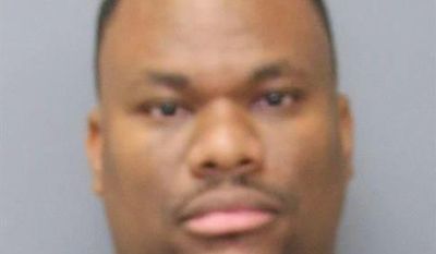 This undated photo provided by the Charles County Sheriff’s Department shows Carlos Deangelo Bell. A teachers&#39; aide and track coach described as a &amp;quot;predator&amp;quot; by a county prosecutor now faces more than 100 felony counts of child sex abuse and other offenses. Local media reported on Monday, July 31, 2017, that the counts against Bell include infecting or trying to infect three schoolboys with HIV, filming them in sex acts, giving them marijuana and other crimes from May 2015 to June 2017. (Charles County Sheriff’s Department via AP)