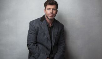 FILE - In this Jan. 21, 2017 file photo, director Taylor Sheridan poses for a portrait to promote the film, &amp;quot;Wind River during the Sundance Film Festival in Park City, Utah. Sheridan’s film takes audiences to the harsh terrain of the Wind River Indian Reservation in Wyoming, where a murder and rape of a young girl sets off a thrilling investigation deep into the forgotten landscape. (Photo by Taylor Jewell/Invision/AP, File)