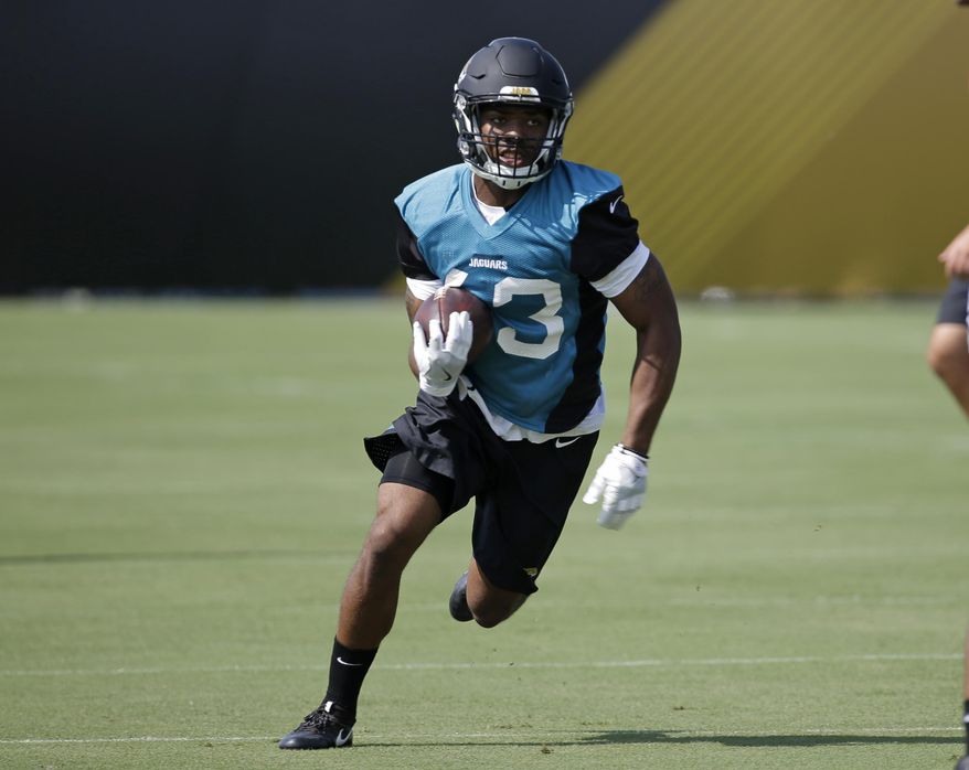 FILE - In this July 28, 2017, file photo, Jacksonville Jaguars running back I'Tavius Mathers (43) runs through a drill during NFL football training camp, in Jacksonville, Fla. Mathers will be released from the hospital a day after suffering a neck injury during practice. The team says Mathers will return to the football facility Wednesday, Aug. 2, 2017, and the medical staff will work with him to "decide the best course of action for his recovery."(AP Photo/John Raoux, File)