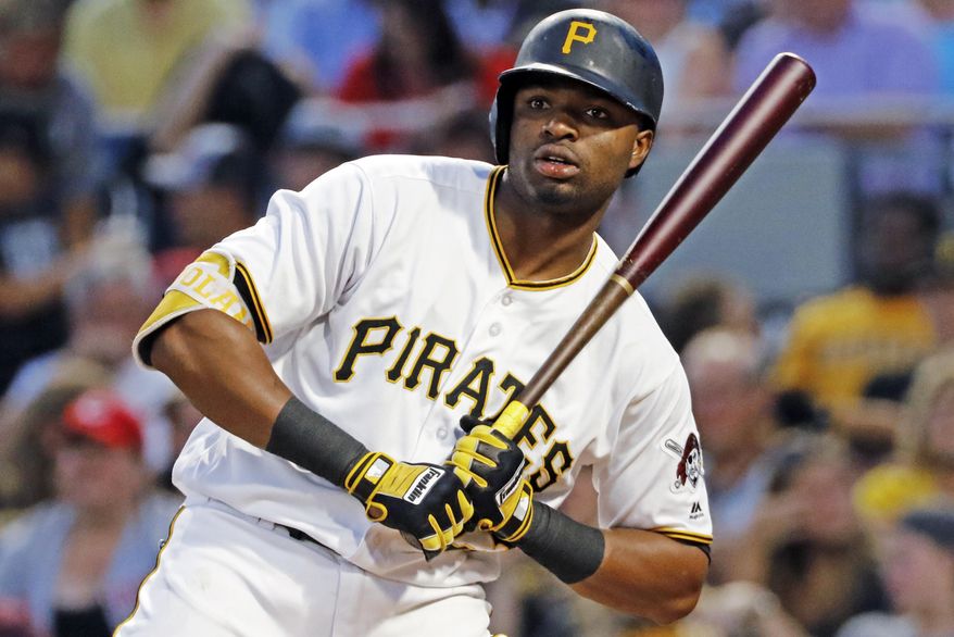 Pittsburgh Pirates' Gregory Polanco gets a sign during a fifth inning at-bat against Cincinnati Reds starting pitcher Robert Stephenson in a baseball game in Pittsburgh, Wednesday, Aug. 2, 2017. Polanco drew a walk. It was Polanco's first game back off the disabled list. (AP Photo/Gene J. Puskar)
