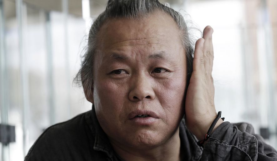 FILE - In this Oct. 3, 2015 photo, South Korean director Kim Ki-duk speaks during an interview at the Busan International Film Festival in Busan, South Korea. South Korean prosecutors are investigating award-winning film director Kim Ki-duk after an actress accused him of hitting her and trying to force her into shooting off-script sexual scenes while making a 2013 movie. (AP Photo/Ahn Young-joon, File)