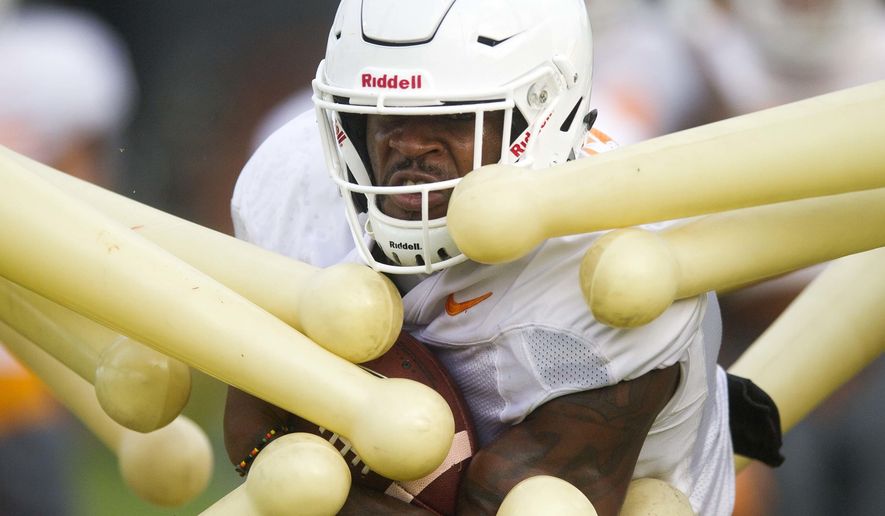 Tennessee running back John Kelly during a drill during NCAA college football practice in Knoxville, Tenn., Tuesday, Aug. 1, 2017. (Caitie McMekinKnoxville News Sentinel via AP)