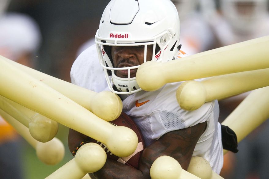 Tennessee running back John Kelly during a drill during NCAA college football practice in Knoxville, Tenn., Tuesday, Aug. 1, 2017. (Caitie McMekinKnoxville News Sentinel via AP)