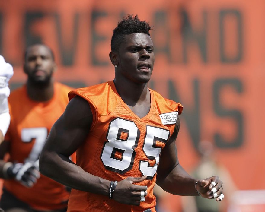 FILE - In this July 28, 2017, file photo, Cleveland Browns tight end David Njoku (85) warms up at practice at the NFL football team's training camp facility, in Berea, Ohio. The first-round draft pick from Miami had better get it together as Cleveland is counting on him to contribute this season. (AP Photo/Tony Dejak, File)