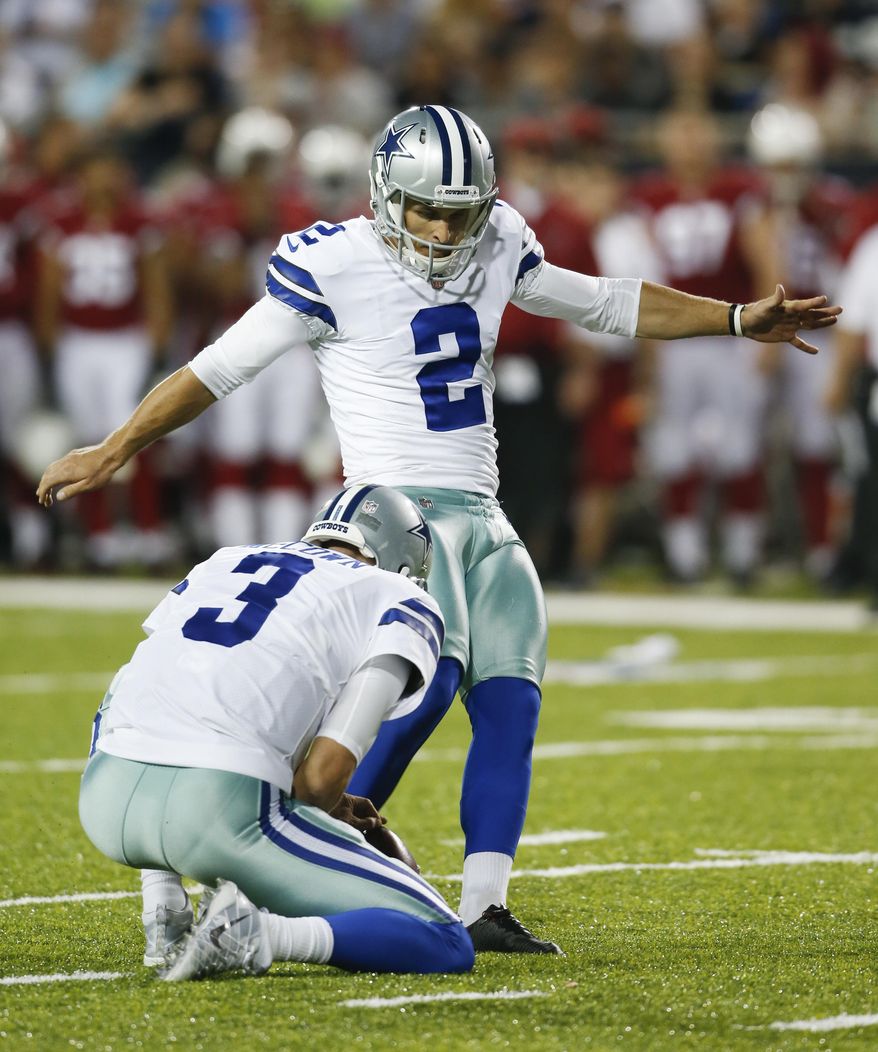 Dallas Cowboys' Sam Irwin-Hill (2) kicks a field goal out of the hold by Luke McCown (3) against the Arizona Cardinals during the first half of the Pro Football Hall of Fame NFL preseason game in Canton, Ohio, Thursday, Aug. 3, 2017. (AP Photo/Ron Schwane)