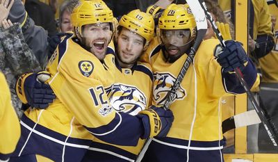FILE - In this Jan. 26, 2017, file photo, Nashville Predators center Calle Jarnkrok (19), of Sweden, celebrates with Mike Fisher (12) and P.K. Subban (76) after Jarnkrok scored a goal against the Columbus Blue Jackets during the second period of an NHL hockey game, in Nashville, Tenn. Mike Fisher has announced his retirement, a move that means the defending Stanley Cup finalists must select a new captain. Fisher, 37, said in a letter to Predators fans that &amp;quot;this is the hardest decision that I&#39;ve ever had to make, but I know I&#39;ve made the right one.&amp;quot; (AP Photo/Mark Humphrey, File)