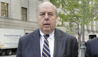 In this April 29, 2011, photo, Attorney John Dowd walks in New York. Dowd, one of the key lawyers in President Donald Trump’s corner navigated a popular United States senator through crisis, produced a damning investigative report that drove a baseball star from the game and, early in his career, took on organized crime as a Justice Department prosecutor. Dowd assumed a more prominent place on the legal team after another lawyer, Marc Kasowitz, took a reduced role. (AP Photo/Richard Drew) **FILE**