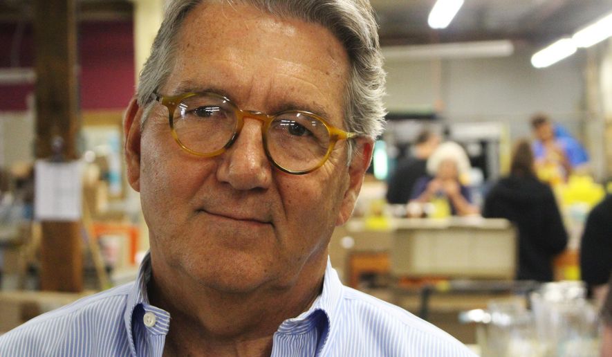 In this Tuesday, July 25, 2017, photo, Walt Rowen poses for a photo at his decorative glass company, the Susquehanna Glass Co., in Columbia, Pa. With premiums on the federal health insurance exchange rising, Rowen began offering employer-provided group health insurance to his employees. If you are like roughly half of Americans who get their health insurance through an employer, relax. The turmoil around “Obamacare” all but guarantees you’ll still be able to do that. (AP Photo/Michael Rubinkam)