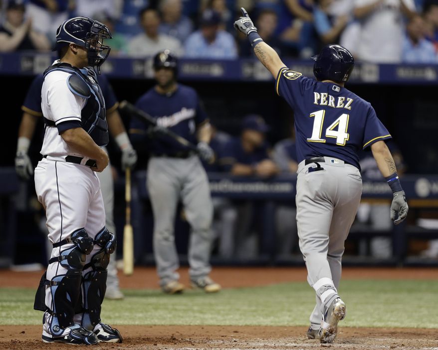 Milwaukee Brewers&#39; Hernan Perez (14) celebrates his home run off Tampa Bay Rays pitcher Ryne Stanek during the eighth inning of a baseball game Saturday, Aug. 5, 2017, in St. Petersburg, Fla. (AP Photo/Chris O&#39;Meara)