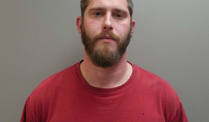 This undated image provide by the Paulding County Sheriff’s Office shows Branden Powell. Authorities say a manhunt is under way for Powell, an Ohio rape suspect who overpowered a sheriff’s deputy in a transport van and stole his gun and ammunition. (Paulding County Sheriff’s Office via AP)