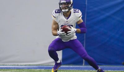 This Nov. 24, 2016 file photo shows Minnesota Vikings wide receiver Adam Thielen (19) running the ball against the Detroit Lions during an NFL football game in Detroit. Four years ago, Thielen was an NFL long shot, a feel-good story at Vikings training camp with his home-state team on the Minnesota State University campus where played in college. Now he’s an integral part of the offense, coming off a breakout season. (AP Photo/Rick Osentoski, file)