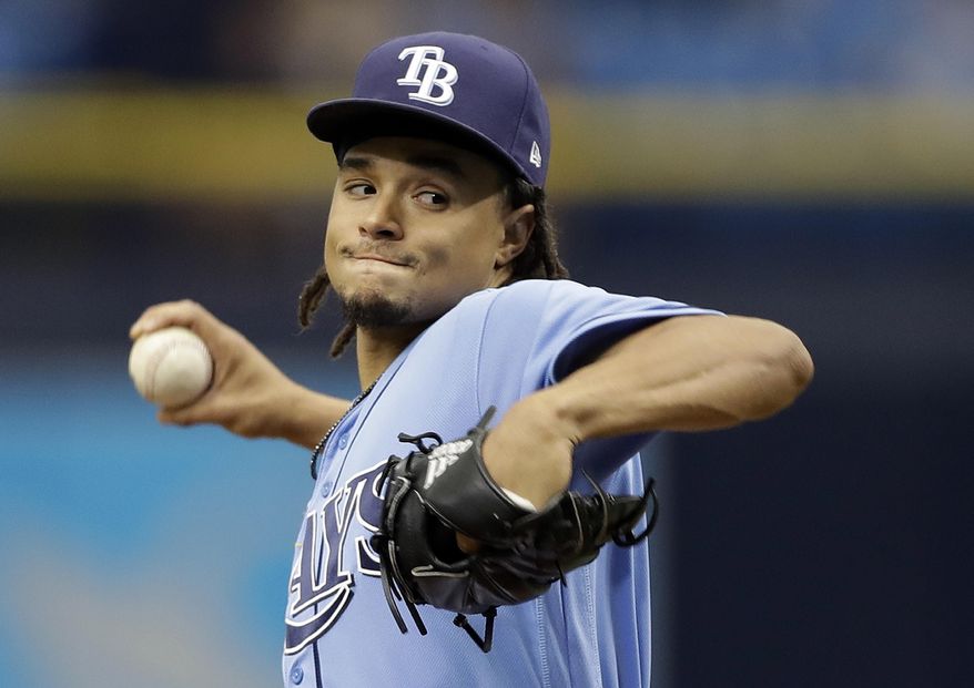 Tampa Bay Rays&#39; Chris Archer goes into his windup against the Milwaukee Brewers during the first inning of an interleague baseball game, Sunday, Aug. 6, 2017, in St. Petersburg, Fla. (AP Photo/Chris O&#39;Meara)