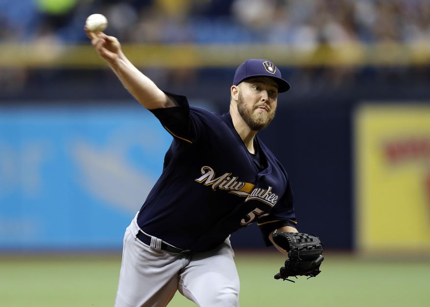 Milwaukee Brewers&#39; Jimmy Nelson pitches to the Tampa Bay Rays during the first inning of an interleague baseball game, Sunday, Aug. 6, 2017, in St. Petersburg, Fla. (AP Photo/Chris O&#39;Meara)