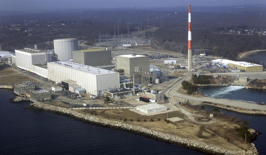 FILE - This March 18, 2003 file photo shows the Millstone Nuclear Power Station in Waterford, Conn. Owners of the facility said they still want more than a study of the facility's future economic viability to ensure the plant remains open and continues providing more than half of Connecticut's electricity. They contend state lawmakers, who have been meeting behind closed doors during the summer of 2017 to hammer out a budget deal, must take prompt action. (AP Photo/Steve Miller, File)