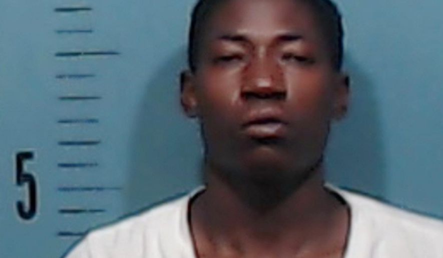 This photo provided by the Abilene Police Department shows Kanyoni Sedekiy, who was arrested before dawn Friday, Aug. 4, 2017, at an Abilene, Texas, apartment complex. Sedekiy was held Sunday, Aug. 6, on an aggravated robbery charge, after investigators say he was caught snoozing at the scene. (Abilene Police Department via AP)