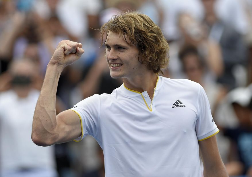 Alexander Zverev, of Germany, pumps his fist to the crowd as he celebrates his win over Kevin Anderson, of South Africa, in the finals of the Citi Open tennis tournament, Sunday, Aug. 6, 2017, in Washington. Zverev won 6-4, 6-4. (AP Photo/Nick Wass)
