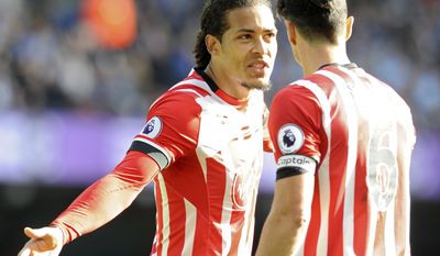 FILE- In this Sunday, Oct. 23, 2016 file photo, Southampton&#x27;s Virgil van Dijk, left, with a team mate during the English Premier League soccer match between Manchester City and Southampton at the Etihad Stadium in Manchester, England. Southampton defender says he has handed in a transfer request to leave the English Premier League club, expressing frustration that interest from &amp;quot;multiple top clubs have been consistently rebuffed.&amp;quot; (AP Photo/Rui Vieira, File)