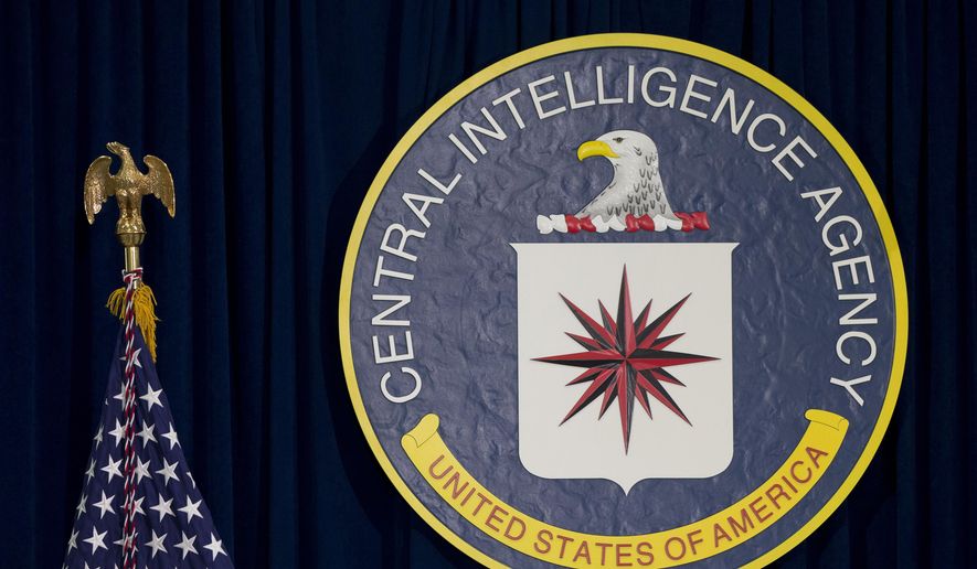 This April 13, 2016 file photo shows the seal of the Central Intelligence Agency at CIA headquarters in Langley, Va. (AP Photo/Carolyn Kaster, File) 