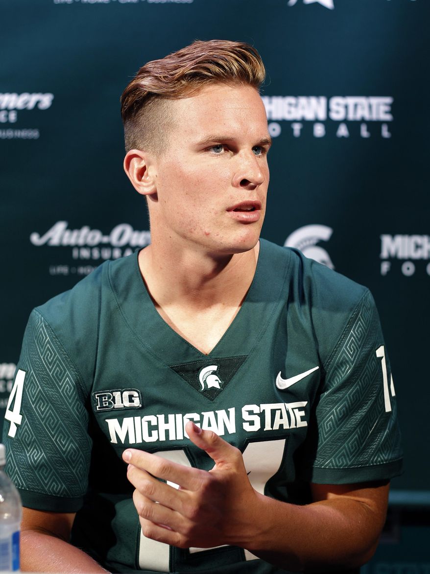 Michigan State quarterback Brian Lewerke answers questions during the team&#39;s NCAA college football media day, Monday, Aug. 7, 2017, in East Lansing, Mich. (AP Photo/Al Goldis)