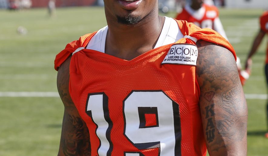 FILE - This June 13, 2017 file photo shows Cleveland Browns wide receiver Corey Coleman (19) walking off the field during NFL football practice at the team's training facility in Berea, Ohio. Coleman has been cleared of any wrongdoing in an assault case. The Cuyahoga County Prosecutor’s office said Tuesday, Aug. 8, 2017 that an investigation by detectives into an assault against a 26-year-old man in December “failed to produce sufficient evidence that Corey Coleman was a participant.” (AP Photo/Ron Schwane, file)