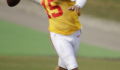 Kansas City Chiefs quarterback Patrick Mahomes (15) throws at NFL football training camp Monday, Aug. 7, 2017, in St. Joseph, Mo. (AP Photo/Charlie Riedel)