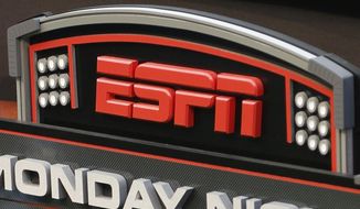 FILE - This Sept. 16, 2013, file photo shows the ESPN logo prior to an NFL football game between the Cincinnati Bengals and the Pittsburgh Steelers, in Cincinnati. ESPN has been a major profit center for Disney, but it&#39;s shedding cable subscribers in droves. (AP Photo/David Kohl, File)