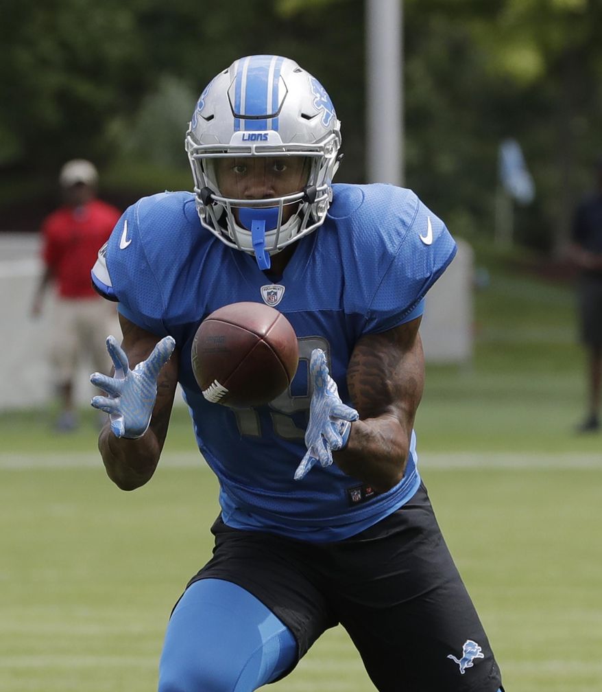 Detroit Lions wide receiver Kenny Golladay makes a catch during NFL football training camp, Monday, Aug. 7, 2017, in Allen Park, Mich. (AP Photo/Carlos Osorio)