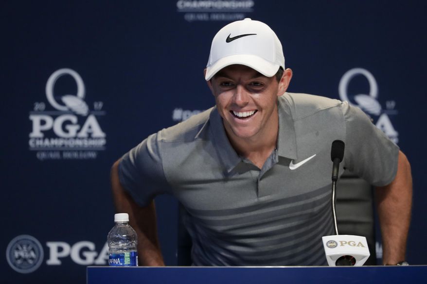Rory McIlroy, of Northern Ireland, arrives for a news conference at the PGA Championship golf tournament at the Quail Hollow Club Tuesday, Aug. 8, 2017, in Charlotte, N.C. (AP Photo/Chris Carlson)