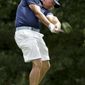 Phil Mickelson hits his tee shot on the 18th hole during a practice round at the PGA Championship golf tournament at the Quail Hollow Club Tuesday, Aug. 8, 2017, in Charlotte, N.C. (AP Photo/Chris Carlson)