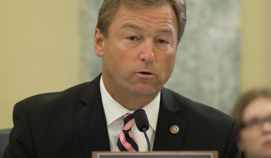 FILE - In this April 2, 2014, file photo, Sen. Dean Heller, R-Nev. speaks on Capitol Hill in Washington. Heller will face a challenge in the 2018 GOP primary by a conservative who is aligning himself with President Donald Trump. The bid by Danny Tarkanian, a 55-year-old Las Vegas businessman, makes good on conservatives’ threats to challenge incumbents who they blame for hurting the years-long quest to dismantle the Obama-era health care law.  (AP Photo/Pablo Martinez Monsivais, File)