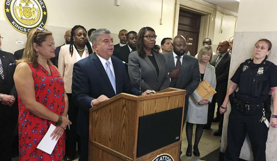 Acting Brooklyn District Attorney Eric Gonzalez, second left, discusses during a news conference, his office's request to dismiss about 143,000 arrest warrants for people who didn't pay tickets for minor offenses years ago, in Brooklyn, N.Y., Wednesday Aug. 9, 2017. He is flanked by New York City Council Speaker Melissa Mark-Viverito, left, and New York City Public Advocate Letitia James, third left. District attorneys in the Bronx, Manhattan and Queens boroughs made similar requests, resulting in courts throwing out a total of over 640,000 such warrants in a single day. (AP Photo/Jennifer Peltz)