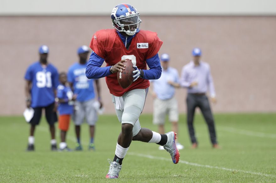 New York Giants quarterback Josh Johnson looks to pass during NFL football training camp, Tuesday, Aug. 8, 2017, in East Rutherford, N.J. (AP Photo/Julio Cortez)