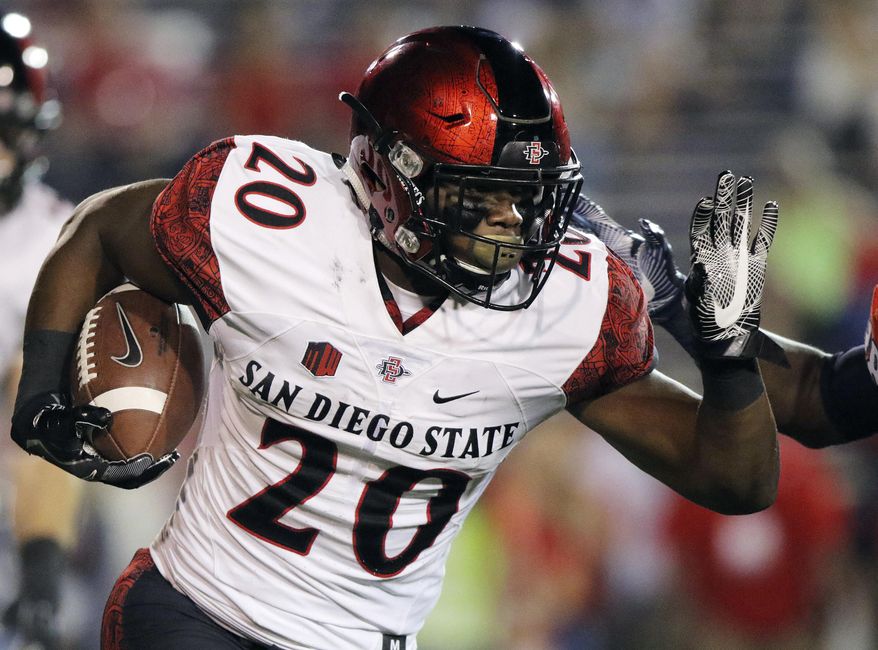 FILE - In this Oct. 1, 2016, file photo, San Diego State Aztecs running back Rashaad Penny runs the ball against the South Alabama Jaguars during the first half of an NCAA college football game in Mobile, Ala. (AP Photo/Dan Anderson, File)