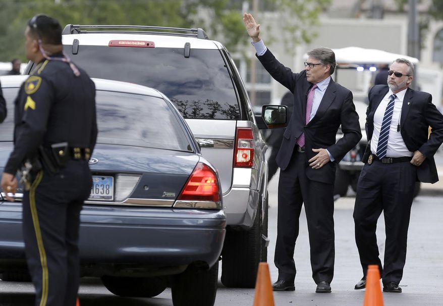 Rick Perry, Secretary of Energy and former Texas Governor, arrives for the memorial service for former Texas Governor Mark White at Second Baptist Church, Wednesday, Aug. 9, 2017 in Houston. White, who battled kidney cancer, died Saturday at age 77. (Melissa Phillip/Houston Chronicle via AP)