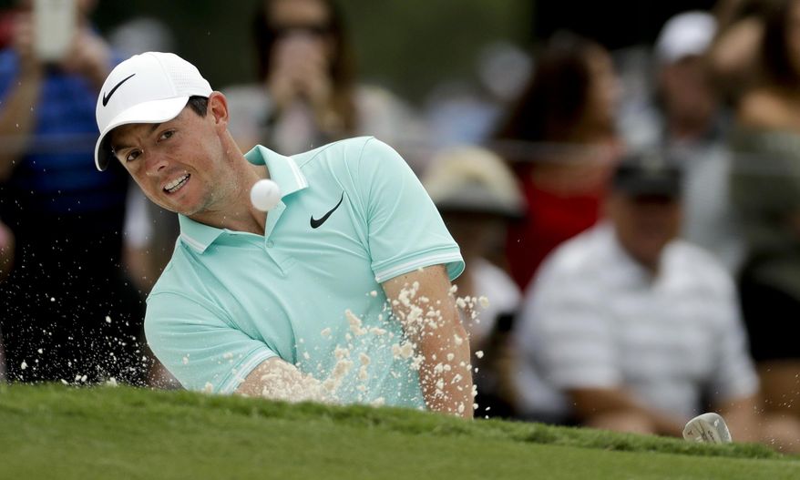 Rory McIlroy of Northern Ireland, hits from the bunker on the ninth hole during a practice round at the PGA Championship golf tournament at the Quail Hollow Club Wednesday, Aug. 9, 2017, in Charlotte, N.C. (AP Photo/Chris Carlson)