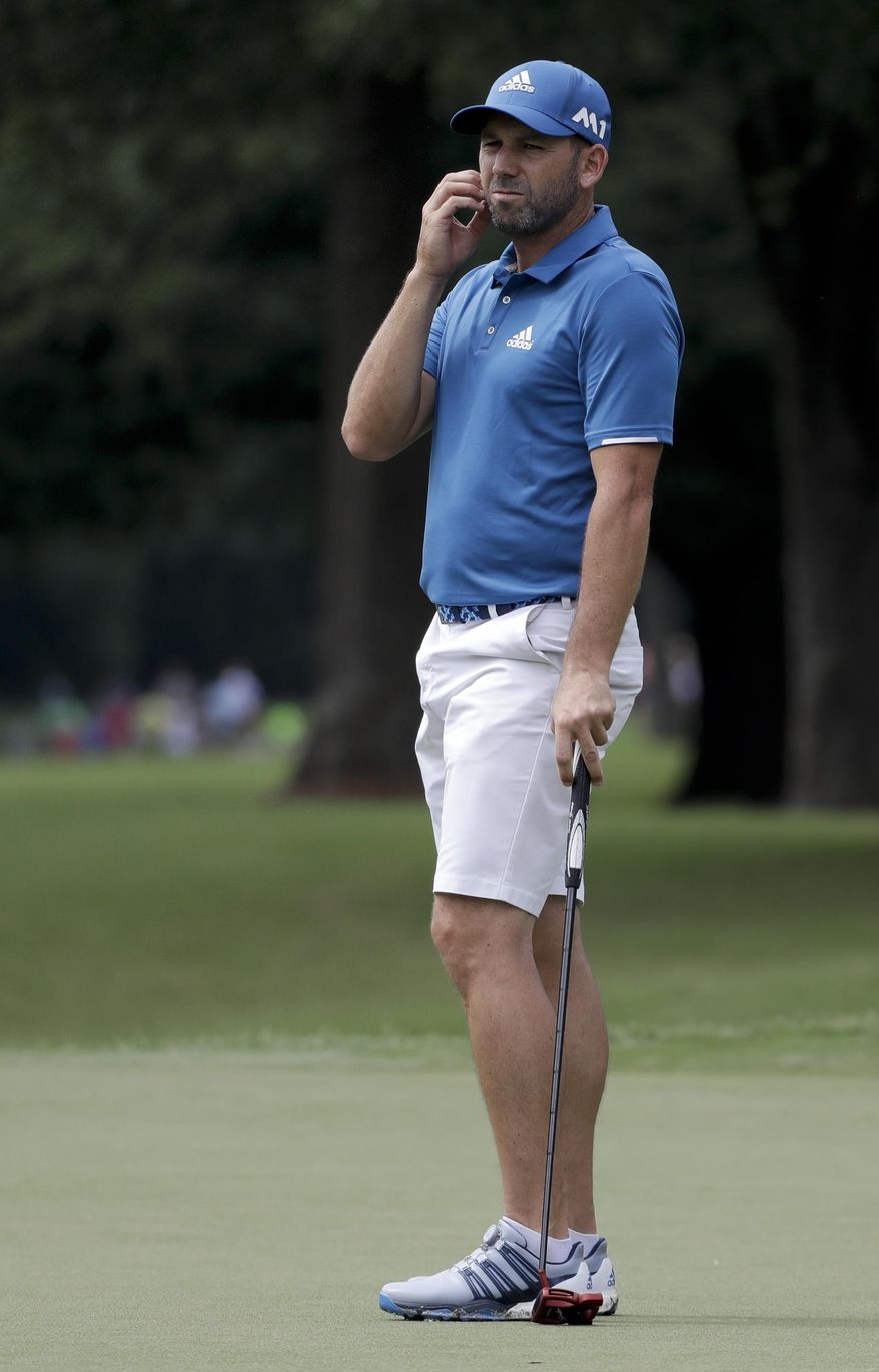 Sergio Garcia, of Spain, watches his putt on the ninth hole during a practice round for the PGA Championship golf tournament at the Quail Hollow Club, Wednesday, Aug. 9, 2017, in Charlotte, N.C. (AP Photo/Chris Carlson)