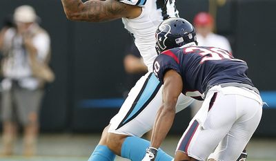 Carolina Panthers wide receiver Kelvin Benjamin (13) makes the catch against Houston Texans cornerback Kevin Johnson (30) during the first half of an NFL preseason football game, Wednesday, Aug. 9, 2017, in Charlotte, N.C. (AP Photo/Jason E. Miczek)